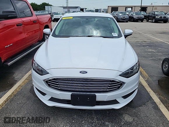 2017 Ford Fusion SE z VIN 3FA6P0H73HR319658, wystawiony jako IAAI lot #42806844 z przebiegiem 76 939 mil mil oraz . Historia ofert i sprzedaży dostępna na DreamBid. Obrazek 6.