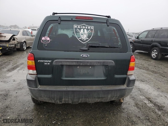 2003 Ford Escape XLS Popular with VIN 1FMYU021X3KA70123, listed as a Copart auction lot 86005514 with 0 mi miles and Salvage Title. Bid and sale history available at carsss.com. Image 6.