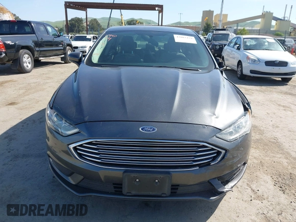 2017 Ford Fusion S with VIN 3FA6P0G72HR190331, listed as a IAAI auction lot 42003479 with 130,252 mi miles. Bid and sale history available at carsss.com. Image 12.