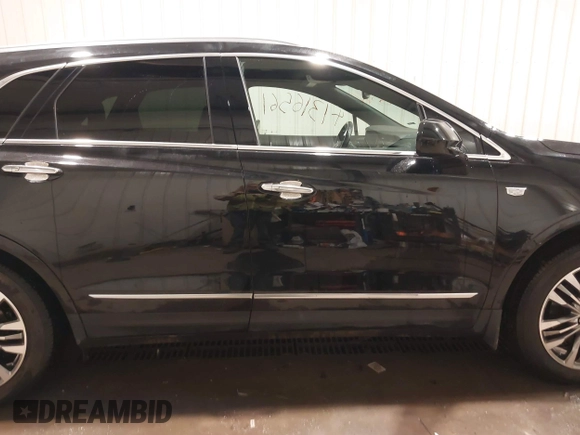 2019 Cadillac XT5 Premium Luxury AWD z VIN 1GYKNFRSXKZ189590, wystawiony jako IAAI lot #41316561 z przebiegiem 98 755 mil mil oraz . Historia ofert i sprzedaży dostępna na DreamBid. Obrazek 14.