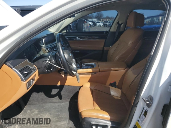 2016 BMW 7 Series 750i xDrive с VIN WBA7F2C57GG418537, выставлен на аукционе Copart как лот 48028195 с пробегом 110 714 миль миль и Списание • Salvage title. История ставок и продаж доступна на DreamBid. Изображение 7.