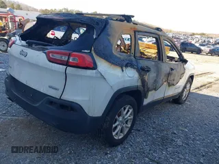 2014 Jeep Cherokee Altitude with VIN 1C4PJMCB5EW120946, listed as a IAAI auction lot 41348100 with Not Provided miles and . Bid and sale history available at DreamBid. Image 4.
