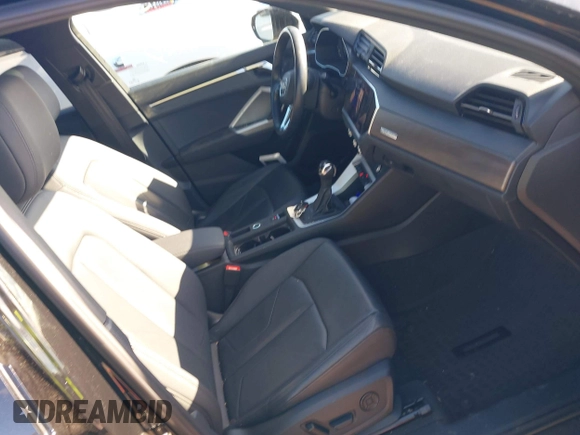 2022 Audi Q3 Premium with VIN WA1AUCF34N1016242, listed as a IAAI auction lot 42341953 with 53,650 mi miles and . Bid and sale history available at DreamBid. Image 5.