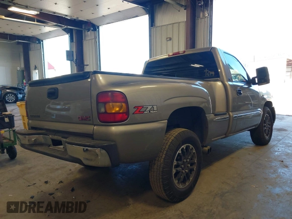 2000 GMC Sierra 1500 SLE with VIN 1GTEK14T6YZ342215, listed as a IAAI auction lot 42023647 with 142,649 mi miles and . Bid and sale history available at DreamBid. Image 4.