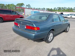 2001 Toyota Camry CE with VIN 4T1BG28K91U852861, listed as a IAAI auction lot 41912480 with 217,404 mi miles. Bid and sale history available at carsss.com. Image 4.