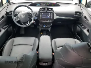 2021 Toyota Prius L Eco with VIN JTDKAMFU1M3146516, listed as a Copart auction lot 58406175 with 19,911 mi miles and Salvage title. Bid and sale history available at DreamBid. Image 8.