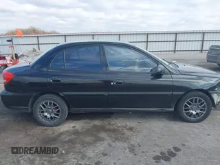 2005 Kia Rio with VIN KNADC125X56377797, listed as a IAAI auction lot 41685739 with 103,390 mi miles. Bid and sale history available at carsss.com. Image 13.