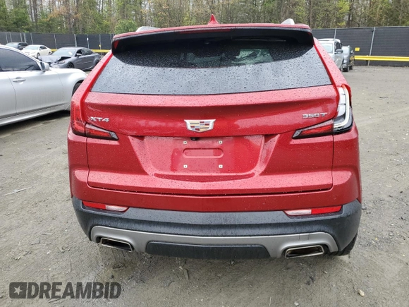 2021 Cadillac XT4 FWD Premium Luxury with VIN 1GYFZCR40MF011603, listed as a Copart auction lot 53068825 with 84,919 mi miles and Salvage title. Bid and sale history available at DreamBid. Image 6.
