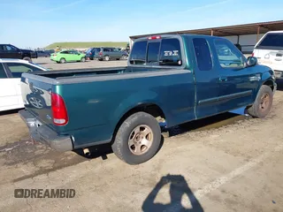 1999 Ford F-150 XL with VIN 1FTRX17L3XNC30010, listed as a IAAI auction lot 41632812 with 268,884 mi miles. Bid and sale history available at carsss.com. Image 4.