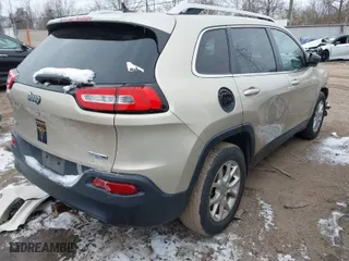 2014 Jeep Cherokee Latitude with VIN 1C4PJMCS4EW264522, listed as a IAAI auction lot 41618276 with 162,652 mi miles. Bid and sale history available at carsss.com. Image 4.