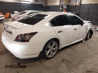 2012 Nissan Maxima S z VIN 1N4AA5AP3CC852183, wystawiony jako IAAI lot #42263656 z przebiegiem 159 370 mil mil oraz . Historia ofert i sprzedaży dostępna na DreamBid. Obrazek 4.