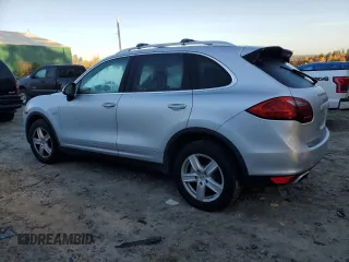 2012 Porsche Cayenne S Hybrid with VIN WP1AE2A25CLA90720, listed as a Copart auction lot 76467154 with 100,460 mi miles and Clean title. Bid and sale history available at DreamBid. Image 2.
