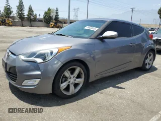 2014 Hyundai Veloster z VIN KMHTC6AD9EU200511, wystawiony jako Copart lot #59934645 z przebiegiem 176 436 mil mil oraz Czysty tytuł • Clean title. Historia ofert i sprzedaży dostępna na DreamBid. Obrazek 1.