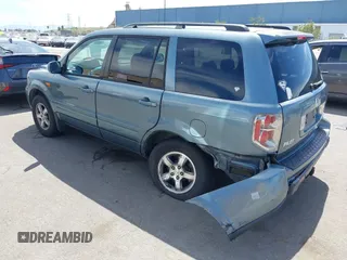 2007 Honda Pilot EX with VIN 2HKYF18447H520522, listed as a IAAI auction lot 42018937 with 128,401 mi miles. Bid and sale history available at carsss.com. Image 3.