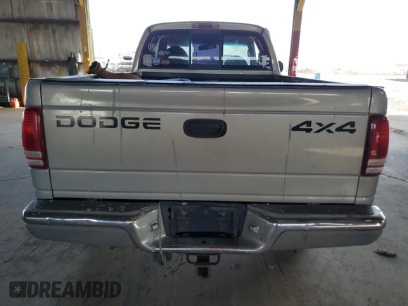 1999 Dodge Dakota SLT with VIN 1B7GG22Y0XS259031, listed as a Copart auction lot 87972505 with 153,354 mi miles and Salvage Title. Bid and sale history available at DreamBid. Image 6.