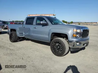 2015 Chevrolet Silverado 1500 LT with VIN 3GCUKRECXFG453985, listed as a Copart auction lot 51987285 with 101,417 mi miles and Salvage Title. Bid and sale history available at carsss.com. Image 4.