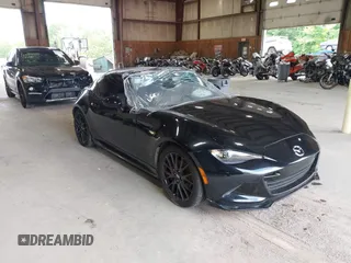 2021 Mazda MX-5 Miata Club with VIN JM1NDAL70M0457759, listed as a IAAI auction lot 42645044 with 33,853 mi miles and . Bid and sale history available at DreamBid. Image 1.