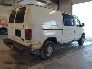 2003 Ford Econoline Cargo z VIN 1FTNE24W53HA22180, wystawiony jako IAAI lot #42206484 z przebiegiem 306 921 mil mil oraz . Historia ofert i sprzedaży dostępna na DreamBid. Obrazek 4.