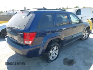 2005 Jeep Grand Cherokee Laredo with VIN 1J4GR48K35C518587, listed as a IAAI auction lot 42741449 with 164,821 mi miles and . Bid and sale history available at DreamBid. Image 4.
