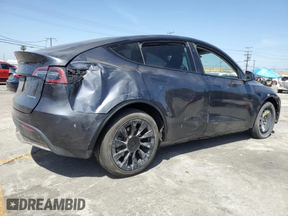 2024 Tesla Model Y Long Range with VIN 7SAYGDEEXRA237667, listed as a Copart auction lot 58260635 with Not provided miles and Salvage title. Bid and sale history available at DreamBid. Image 3.