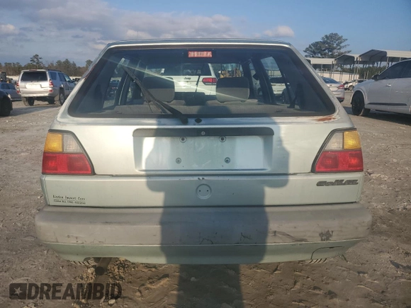 1992 Volkswagen Golf с VIN 3VWFA21G2NM043514, выставлен на аукционе Copart как лот 42501035 с пробегом 267 345 миль миль и Списание • Salvage title. История ставок и продаж доступна на DreamBid. Изображение 6.