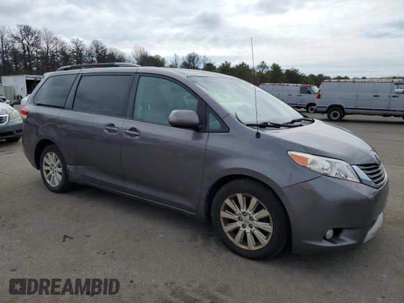 2012 Toyota Sienna XLE with VIN 5TDDK3DC2CS038316, listed as a Copart auction lot 52694245 with 273,415 mi miles and Clean Title. Bid and sale history available at DreamBid. Image 4.
