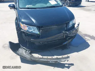 2016 Honda Odyssey Touring Elite with VIN 5FNRL5H95GB045915, listed as a IAAI auction lot 41869980 with 160,270 mi miles. Bid and sale history available at carsss.com. Image 6.