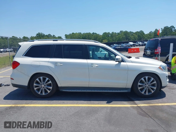 2014 Mercedes-Benz GL 450 with VIN 4JGDF7CE4EA348588, listed as a IAAI auction lot 42601136 with 129,166 mi miles and . Bid and sale history available at DreamBid. Image 14.