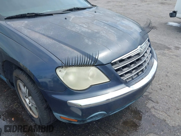 2007 Chrysler Pacifica Touring z VIN 2A8GM68XX7R337064, wystawiony jako IAAI lot #42089124 z przebiegiem 226 919 mil mil oraz . Historia ofert i sprzedaży dostępna na DreamBid. Obrazek 6.