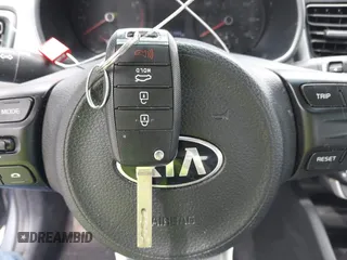 2020 Kia Rio LX with VIN 3KPA24AD9LE332005, listed as a IAAI auction lot 41870210 with 71,777 mi miles and . Bid and sale history available at DreamBid. Image 11.