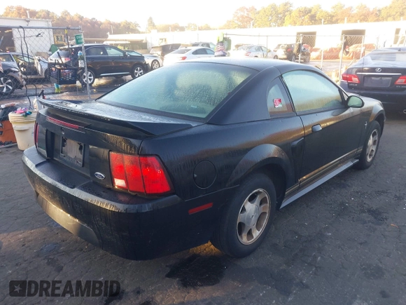 2000 Ford Mustang with VIN 1FAFP4046YF238109, listed as a IAAI auction lot 40656475 with 64,926 mi miles. Bid and sale history available at carsss.com. Image 4.