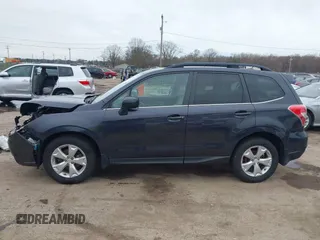 2014 Subaru Forester 2.5i Limited with VIN JF2SJAJC1EH517094, listed as a IAAI auction lot 41953103 with 145,122 mi miles. Bid and sale history available at carsss.com. Image 15.