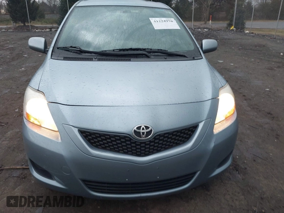 2009 Toyota Yaris z VIN JTDBT903591332683, wystawiony jako IAAI lot #41224976 z przebiegiem 113 305 mil mil oraz . Historia ofert i sprzedaży dostępna na DreamBid. Obrazek 12.
