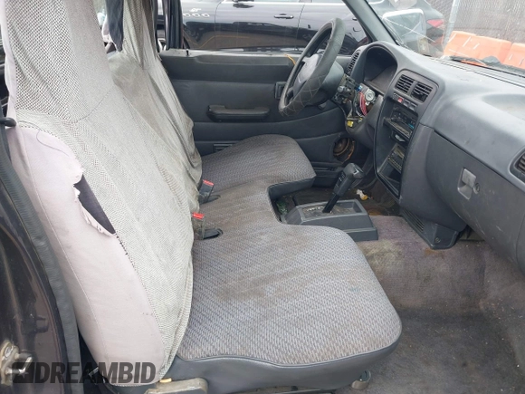 1997 Nissan Frontier XE with VIN 1N6SD11S3VC372292, listed as a IAAI auction lot 42084062 with 193,415 mi miles and . Bid and sale history available at DreamBid. Image 5.