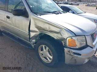 2005 GMC Envoy SLE with VIN 1GKDS13S252284455, listed as a IAAI auction lot 41455172 with 171,559 mi miles. Bid and sale history available at carsss.com. Image 6.