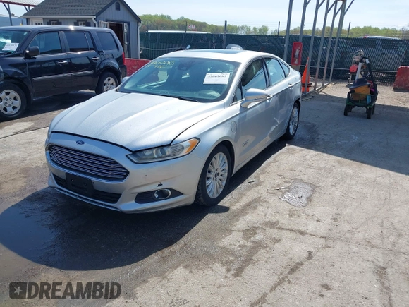 2016 Ford Fusion Energi SE Luxury with VIN 3FA6P0PU8GR273122, listed as a IAAI auction lot 42062083 with 166,318 mi miles. Bid and sale history available at carsss.com. Image 17.