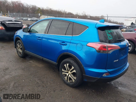 2016 Toyota RAV4 LE with VIN JTMBFREV9GJ100635, listed as a IAAI auction lot 41858669 with 171,644 mi miles. Bid and sale history available at carsss.com. Image 3.