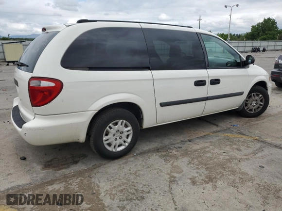 2005 Dodge Caravan SE with VIN 1D4GP24R45B273262, listed as a Copart auction lot 59026005 with 215,054 mi miles and Salvage title. Bid and sale history available at DreamBid. Image 3.