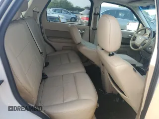 2010 Ford Escape Limited z VIN 1FMCU0EG4AKB30517, wystawiony jako Copart lot #59870285 z przebiegiem 126 483 mil mil oraz Czysty tytuł • Clean title. Historia ofert i sprzedaży dostępna na DreamBid. Obrazek 11.