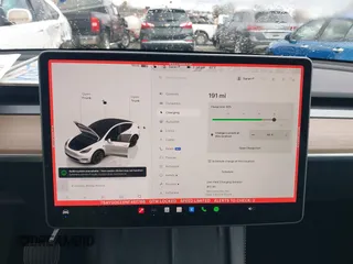 2022 Tesla Model Y Long Range with VIN 7SAYGDEE6NF461788, listed as a IAAI auction lot 41697064 with 34,034 mi miles and . Bid and sale history available at carsss.com. Image 16.