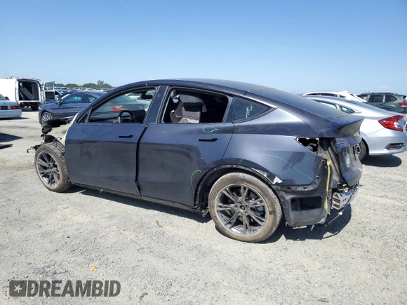 2024 Tesla Model Y Long Range z VIN 7SAYGAEE0RF101971, wystawiony jako Copart lot #58794335 z przebiegiem 16 099 mil mil oraz Szkoda całkowita • Salvage title. Historia ofert i sprzedaży dostępna na DreamBid. Obrazek 2.