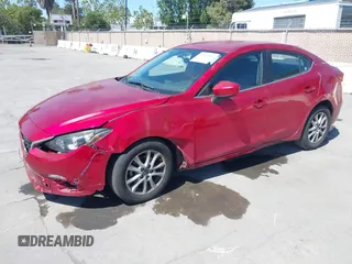 2014 Mazda 3 i Touring with VIN JM1BM1V75E1112948, listed as a IAAI auction lot 42184319 with 59,855 mi miles and . Bid and sale history available at DreamBid. Image 2.