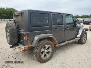 2016 Jeep Wrangler Unlimited Sahara with VIN 1C4BJWEGXGL264740, listed as a Copart auction lot 57225115 with 183,647 mi miles and Salvage title. Bid and sale history available at DreamBid. Image 3.