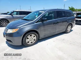 2011 Honda Odyssey LX with VIN 5FNRL5H28BB075583, listed as a Copart auction lot 61029055 with 152,603 mi miles and Salvage title. Bid and sale history available at DreamBid. Image 1.