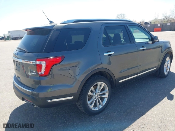2019 Ford Explorer Limited with VIN 1FM5K8FH4KGA89296, listed as a IAAI auction lot 41968541 with 115,712 mi miles. Bid and sale history available at carsss.com. Image 4.
