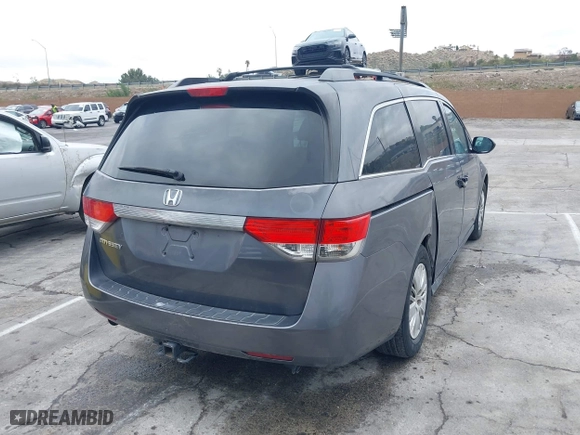 2014 Honda Odyssey LX with VIN 5FNRL5H28EB101376, listed as a IAAI auction lot 41772529 with 122,504 mi miles. Bid and sale history available at carsss.com. Image 4.