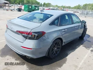2025 Honda Civic Sport z VIN 2HGFE2F59SH542403, wystawiony jako IAAI lot #42064327 z przebiegiem 12 352 mil mil oraz . Historia ofert i sprzedaży dostępna na DreamBid. Obrazek 4.