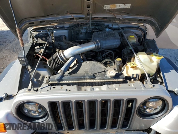 2001 Jeep Wrangler SE with VIN 1J4FA29P11P334902, listed as a Copart auction lot 83883654 with 157,827 mi miles and Salvage Title. Bid and sale history available at carsss.com. Image 12.