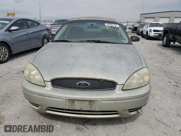 2005 Ford Taurus SE with VIN 1FAFP53U75A125148, listed as a Copart auction lot 49606165 with 216,300 mi miles and Salvage title. Bid and sale history available at DreamBid. Image 5.