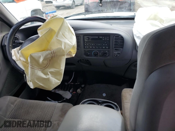 2002 Ford F-150 XL with VIN 1FTRX17L72NB60083, listed as a Copart auction lot 63627985 with Not provided miles and Salvage title. Bid and sale history available at DreamBid. Image 8.